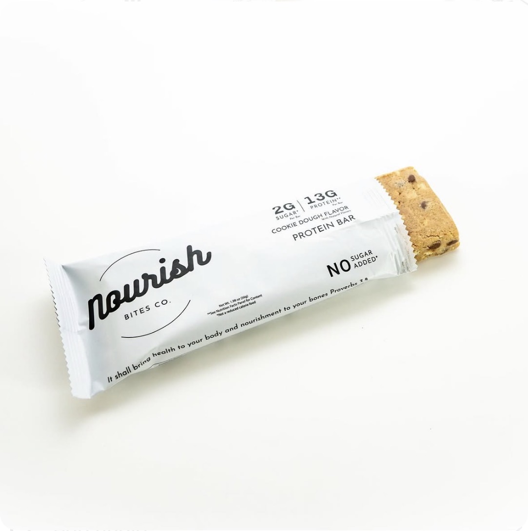 Nourish Bites Co. cookie dough protein bar and wrapper
